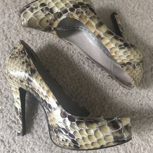 Snakeskin pumps